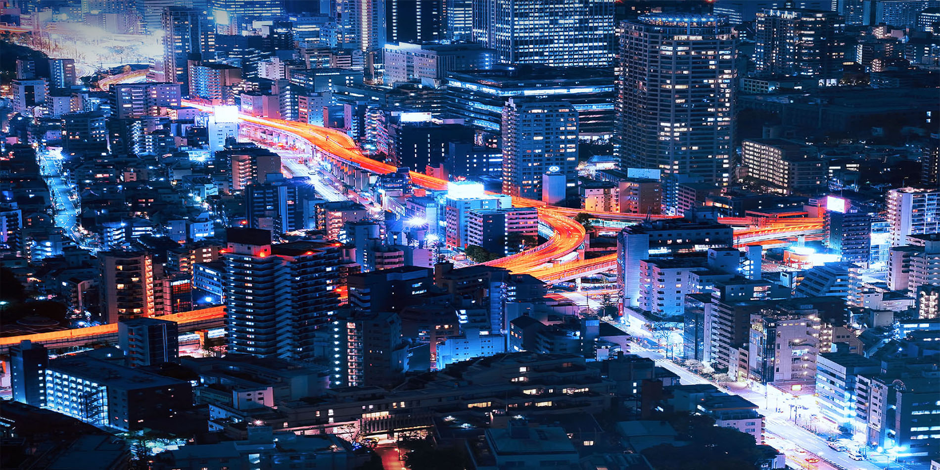 Light streaks over Tokyo's busy streets at night